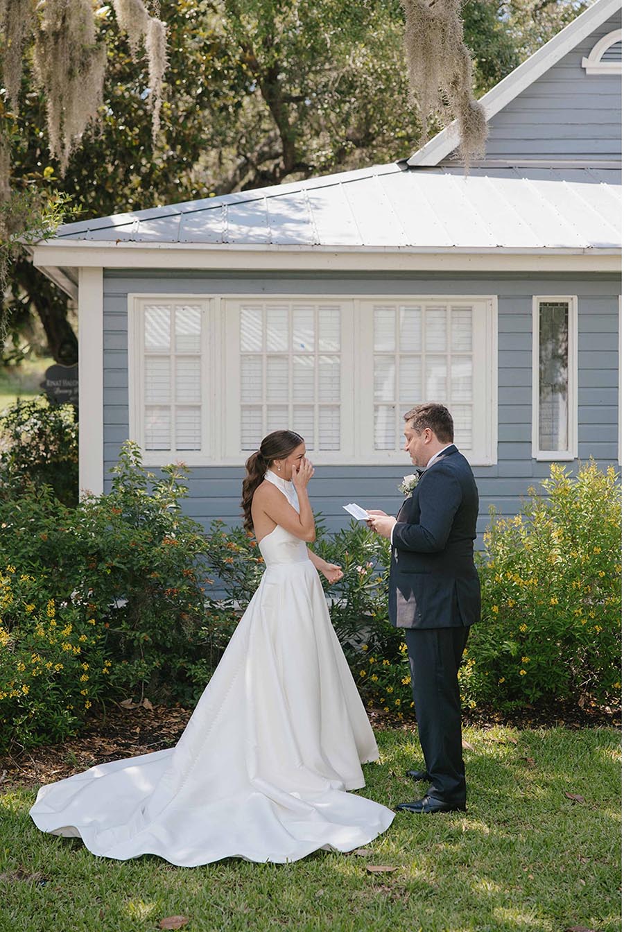 - 08 bride and groom standing outside for their first look before their wedding