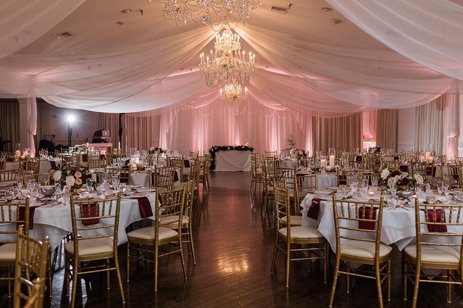 wedding reception hall decorated for an indoor celebration
