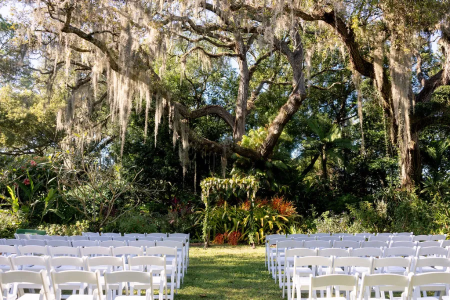 Azalea outdoor wedding venue under large oak tree
