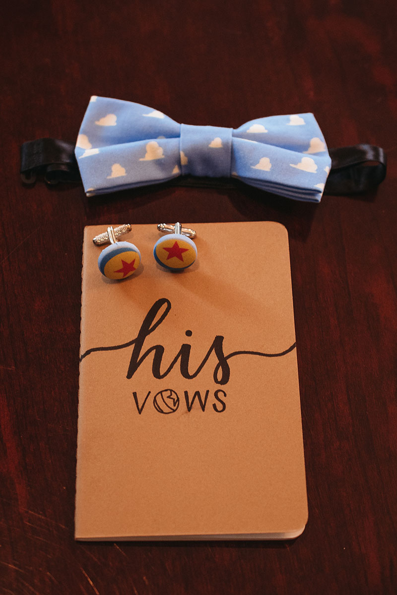 His Wedding Vows booklet, cufflinks, and bow tie.