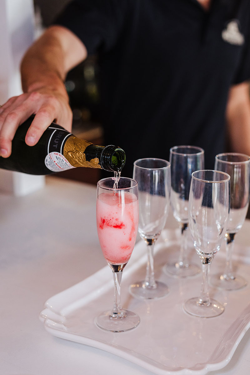 Catering-BLOG-Bridal Shower pouring pink champagne