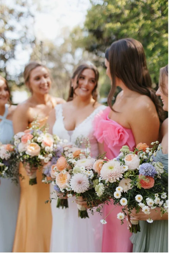 bride and bridesmaids by Mae Murphy Photography