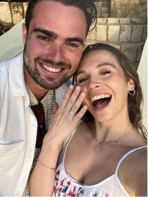 Olivia showing off her engagement ring from Jason