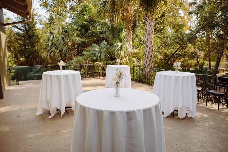 - outdoor patio with hightop tables for wedding reception in Orlando