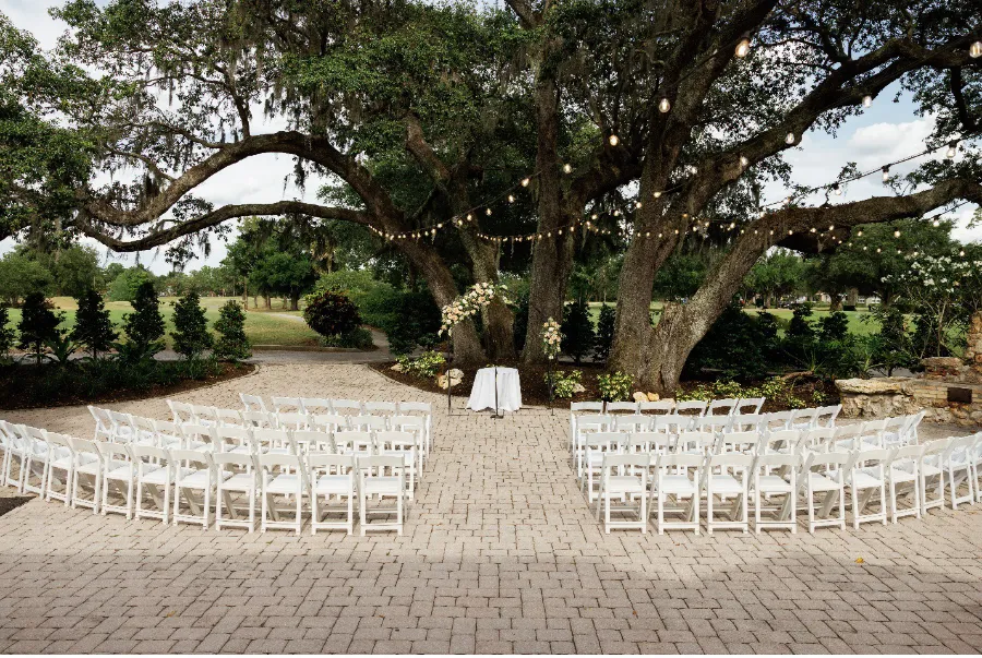 outdoor wedding setup under the large oak trees of the Historic Dubsdread