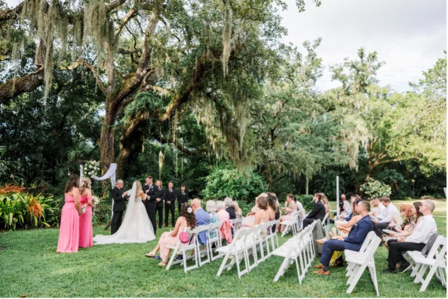 outdoor wedding taking place on the lawn of the Azalea Park in Central Florida