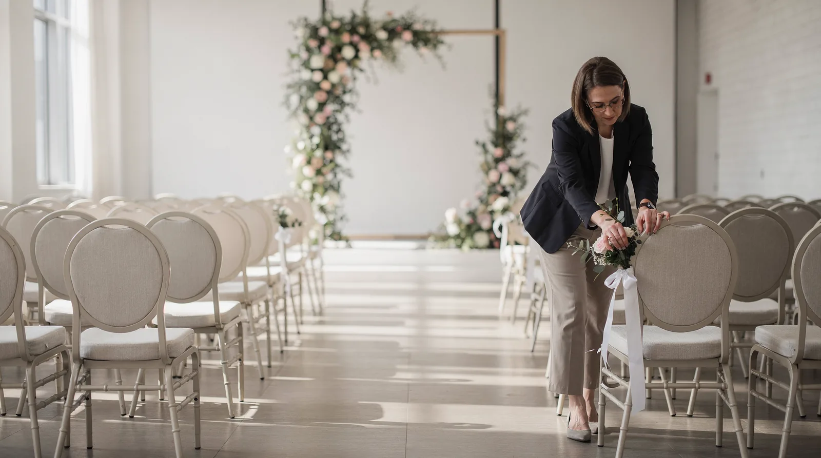 wedding cordinater setting up a wedding venue